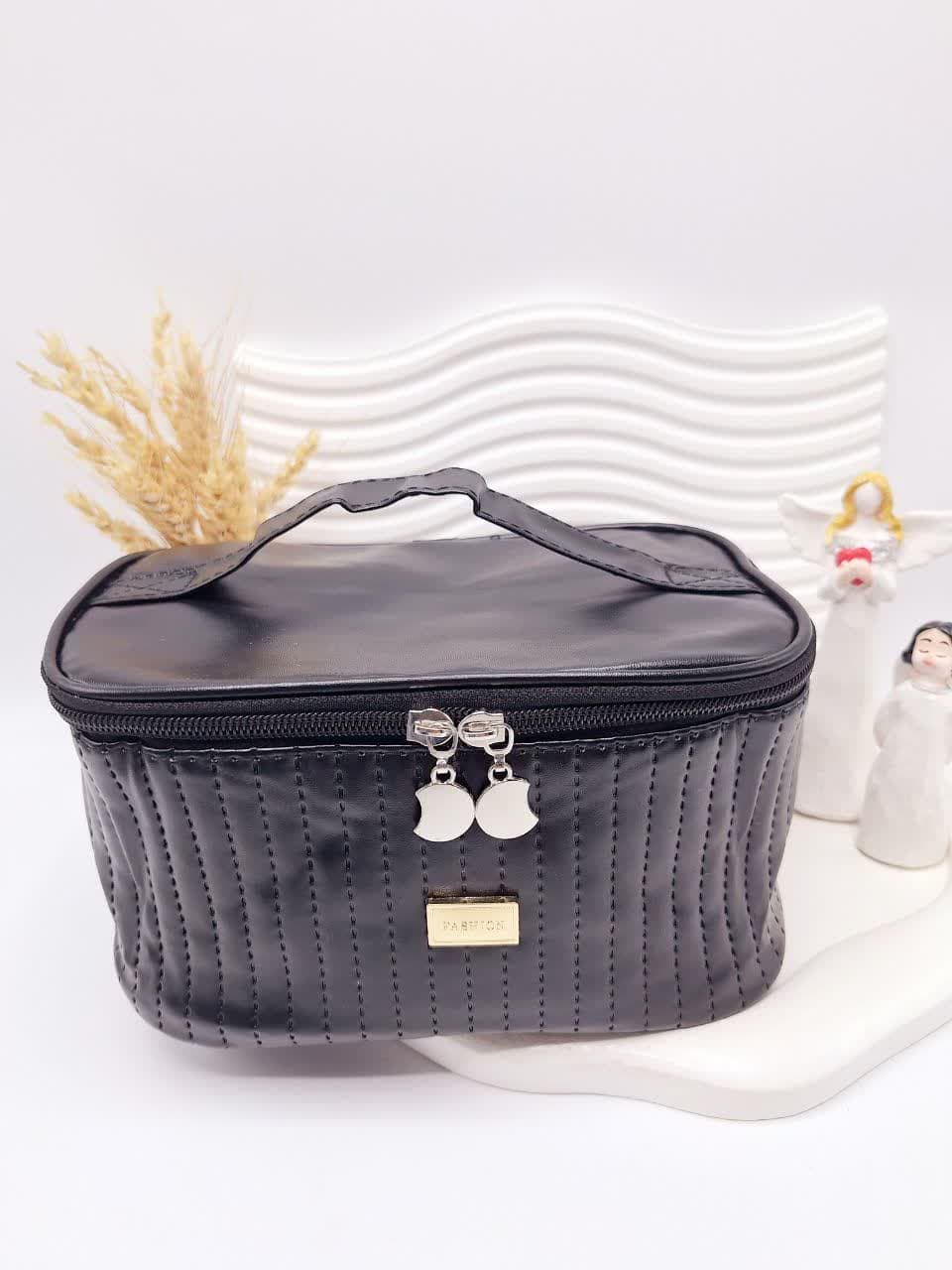 photo_2025-08-12_20-07-00 کیف لوازم آرایشی چرمی دوخت شده (رنگ مشکی) FASHION - Image 1