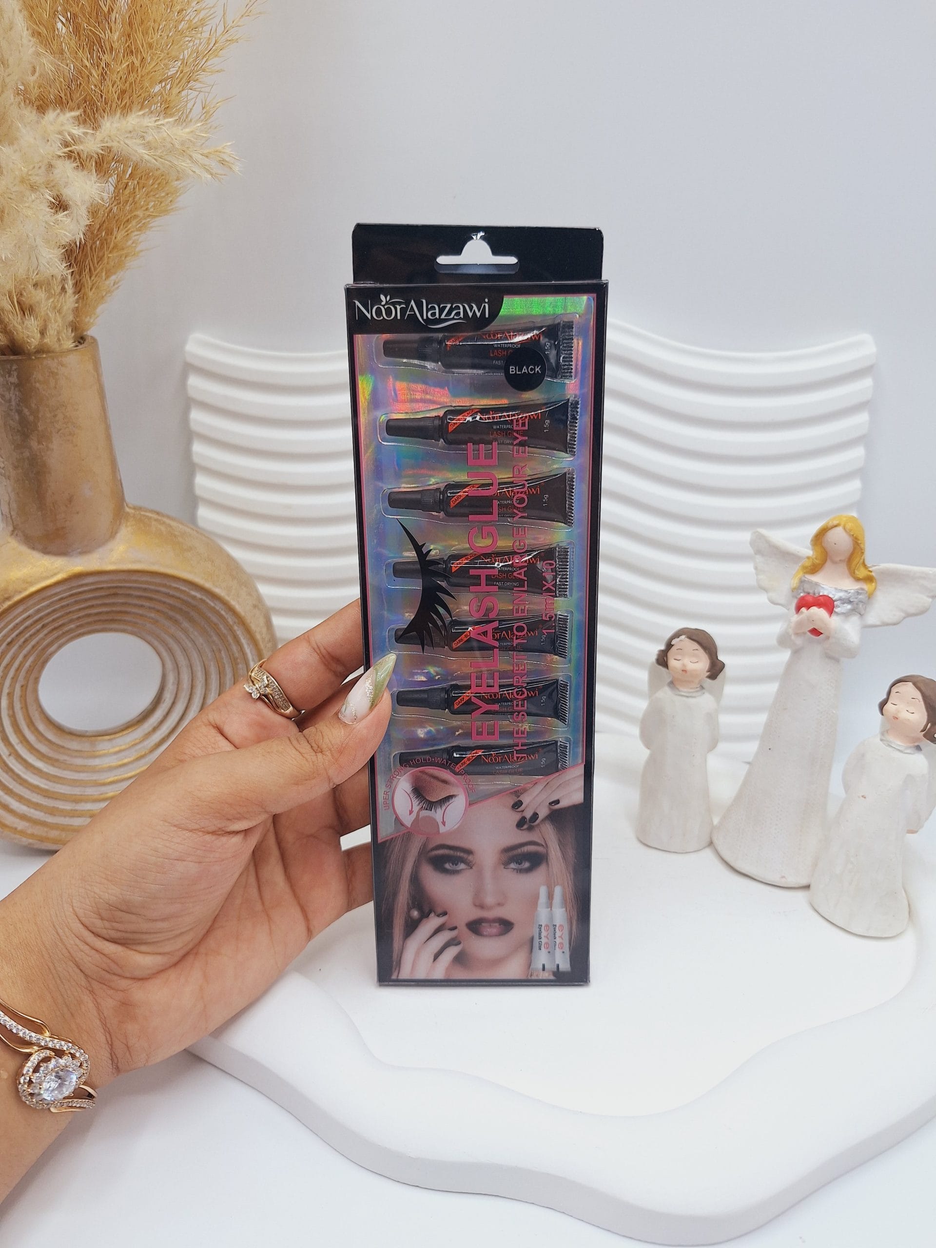 ۲۰۲۵۰۵۰۷_۱۳۳۰۴۰-scaled چسب مژه تکی برند Noor Alazawi حجم 1.5 گرم کد BX-3586 (کارتن مستطیل) - Image 1