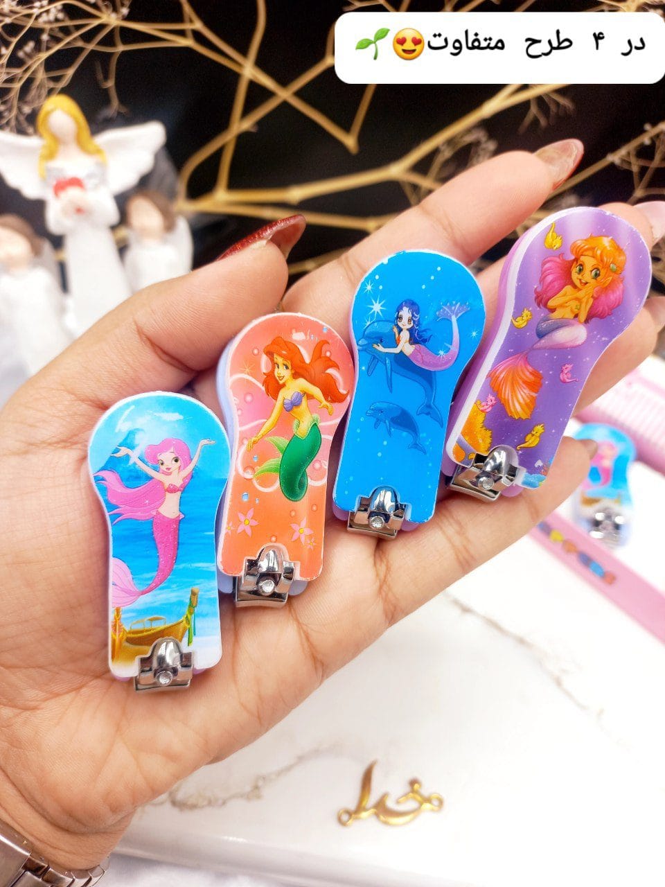 photo_2023-12-30_08-52-27 ناخن گیر طرح پری دریایی کد 001 - Image 1