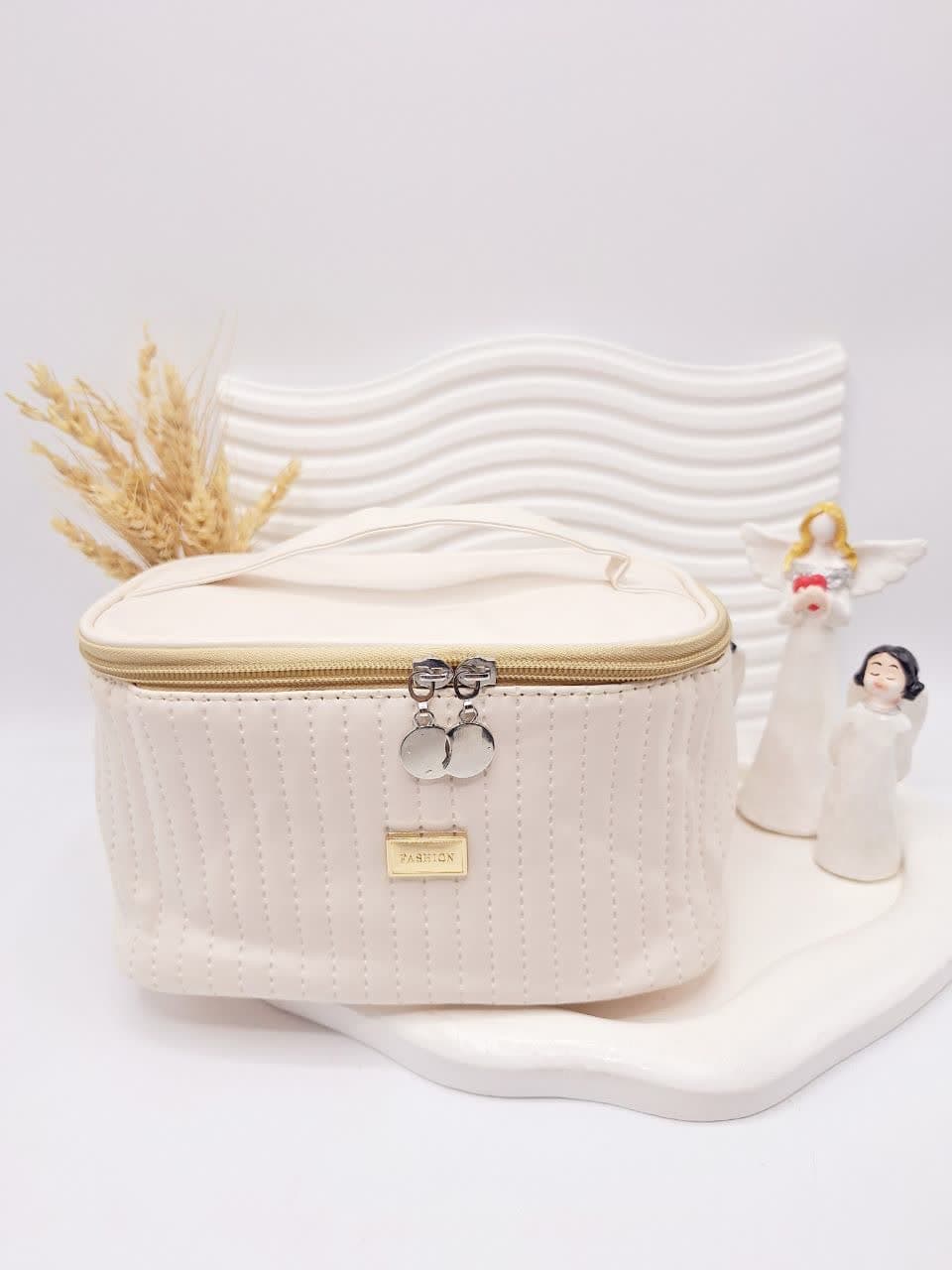 photo_2025-08-12_20-07-05 کیف لوازم آرایشی چرمی دوخت شده (رنگ کرم) FASHION - Image 1