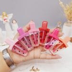 لیپ گلاس شاین دار طرح هندوانه با بوی محشر برند HUDAMOJI کد L738