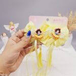 ست 2 تایی گیره مو پاپیونی طرح دختران پرنسسی همراه با آویز نواری و نگین دار