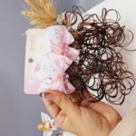 گیره مو دخترونه پاپیون طرح گل مرواريدی با موی مصنوعی (کارت دوتایی)