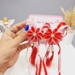 ست 2 تایی گیره مو طرح گل زیبا همراه با آویز نواری و نگین دار