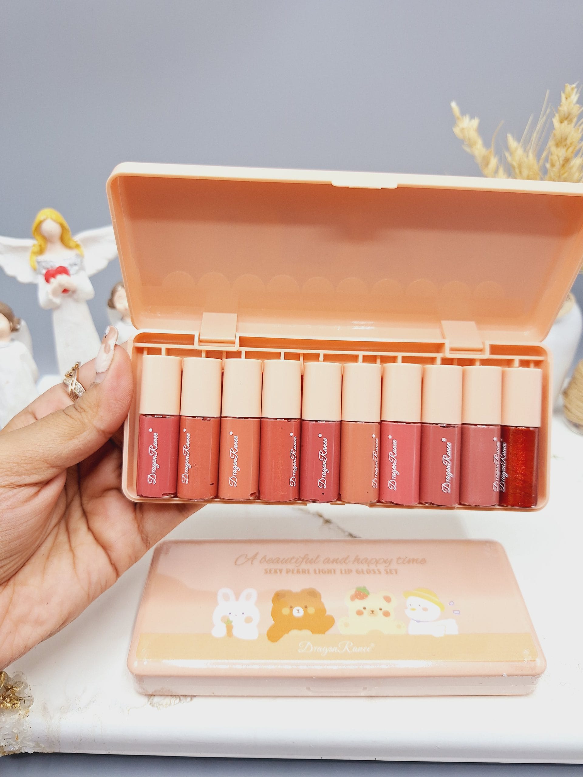 ۲۰۲۴۰۹۰۱_۱۳۱۸۲۴-scaled پک 10 تایی رژ مایع خوش رنگ طرح خرسی برند Dragon Rance کد RD86 - Image 1