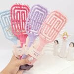 برس اکستنشن مو گره باز کن مخصوص موی فر مدل مارپیچ